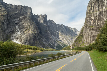Long empty raod in Romsdal valley in Norway