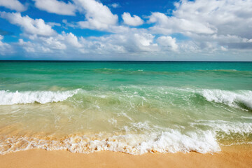 Beautiful beach and waves of Caribbean sea. Riviera Maya, Mexico