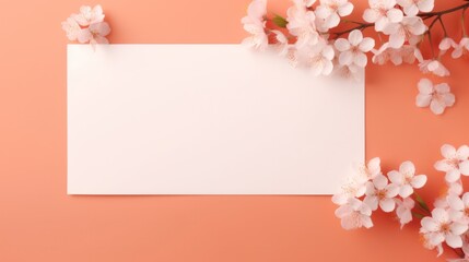 Springtime cherry blossoms with blank card for text. Seasonal floral background.