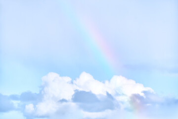 Rainbow and clouds in the sky
