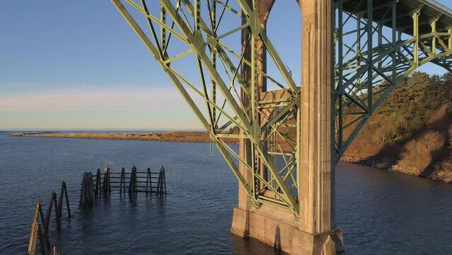 Aerial Drone Video- Yaquina Bay Bridge Sunrise- Newport Oregon- North support - Extreme Close-up - Dolly-out. V11