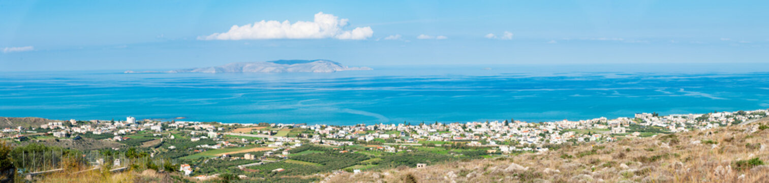 Unique aerial panoramic view of Kokkini Hani summer vacation resort region, with Dia (Dragon) Island in background, Crete, Aegean Sea Greek Islands, Greece. Travel concept.