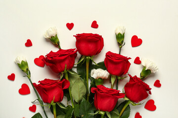 Red roses with carnations and hearts on white background. Valentine's day concept