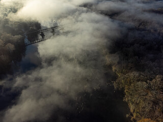 Railroad trestl over Catawba River early in the morning with rising mist
