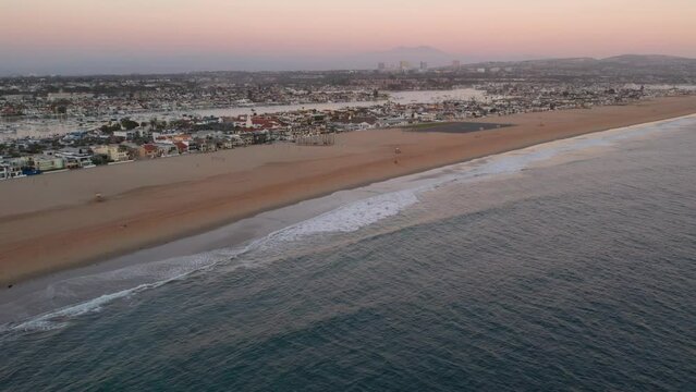 Aerial view of Newport Beach coastline at sunset