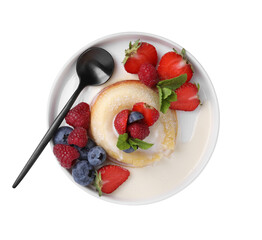 Delicious vanilla fondant with fresh berries isolated on white, top view