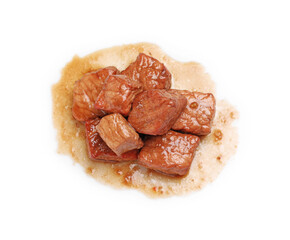 Pieces of delicious cooked beef isolated on white, top view. Tasty goulash