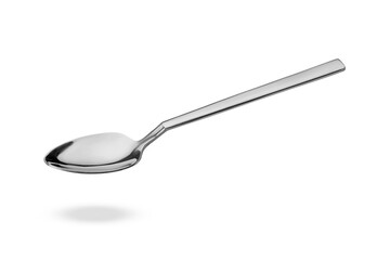 Silver spoon in air isolated on white