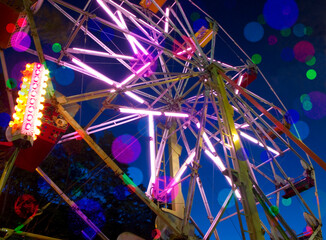 Ferris Wheel at Night with colorful bokeh effect pattern