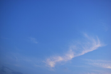 beautiful blue sky and white fluffy cloud with in the evening, natural background