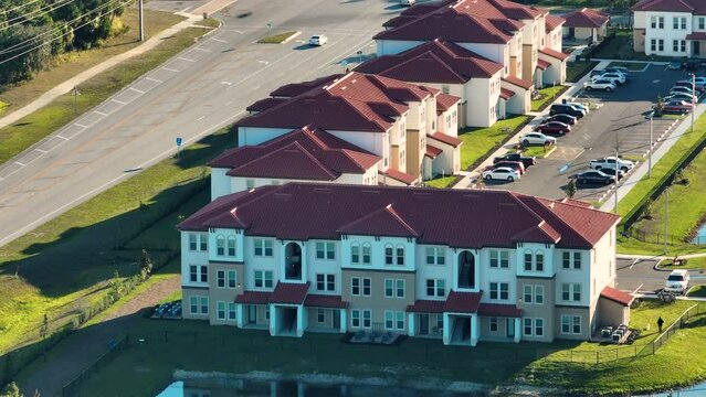 View from above of apartment residential condos in Florida suburban area. American condominiums as example of real estate development in USA suburbs