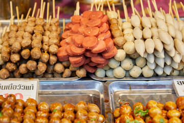 Grilled skewers meatball with spicy tamarind sauce served on plate