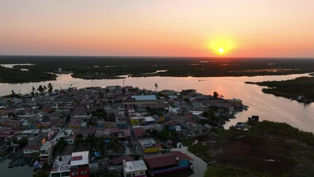 Aerial view backwards over the Mexcaltitan Magic Town, sunset in Nayarit, Mexico