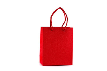 Red paper shopping bag isolated on white