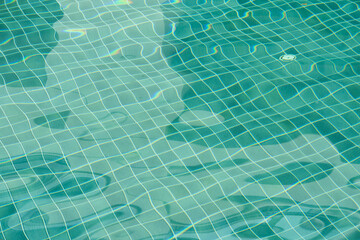 Waves on the surface of the water.