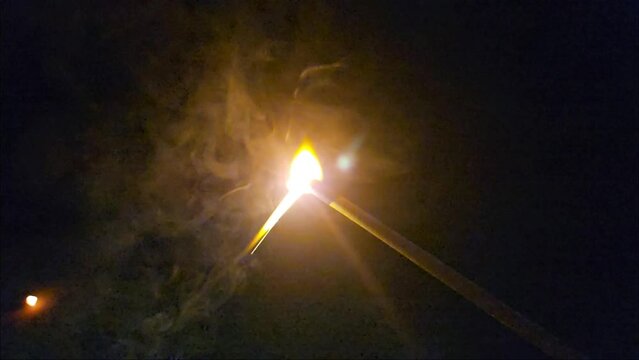 ose up shot of sparklers in dark background. Celebration of Indian festival Diwali