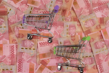 Money Indonesian Rupiah Banknotes, One hundred thousand rupiahs, Indonesian Currency. Shipping cart, money trolley. Financial and investment concept. Economy macro and micro. Seratus ribu rupiah. 
