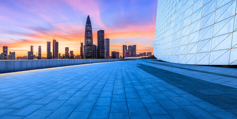 City square and skyline with modern buildings in Shenzhen at sunset, Guangdong Province, China.