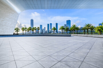 Empty square floors and city skyline with modern buildings scenery