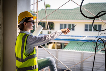 Engineer inspect building structure technicians looking at analyzing unfinished construction project