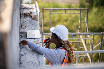 Engineer inspect building structure technicians looking at analyzing unfinished construction project