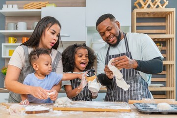 african afro black daughter kids with dad father and mom happy family funny for teach cooking....