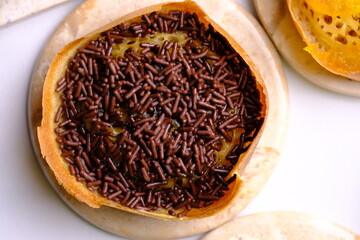 Martabak Manis. Sweet martabak. Sweet snack made from flour, eggs, vanilla, topped with grated...