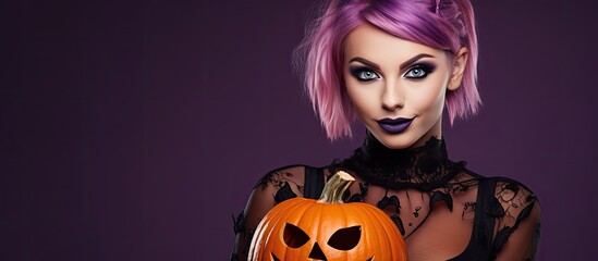 Celebration with woman in Halloween attire, party atmosphere, and traditional food. Violet backdrop, girl holding scary pumpkin.