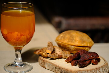 Jamu Kunir Asem is is a traditional Javanese herbal drink made from turmeric, tamarind, brown sugar, and water. This yellow drink is believed to have health benefits and can boost the immune system. 
