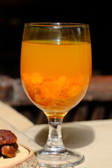Jamu Kunir Asem is is a traditional Javanese herbal drink made from turmeric, tamarind, brown sugar, and water. This yellow drink is believed to have health benefits and can boost the immune system. 