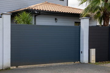Aluminum slide high steel home gray gate sliding portal of suburb house facade