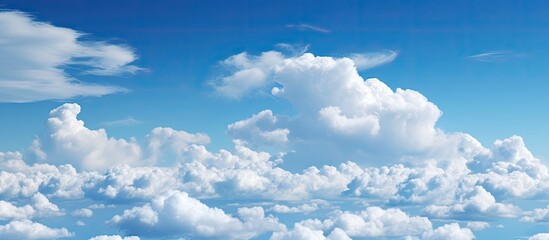 Naklejka na ściany i meble Numerous clouds in a stunning blue sky.