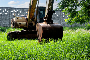 Old broken rusty excavator