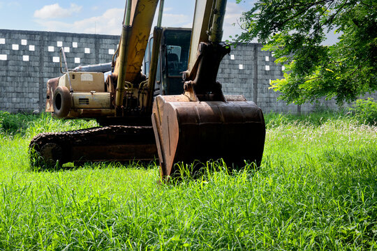 Old broken rusty excavator