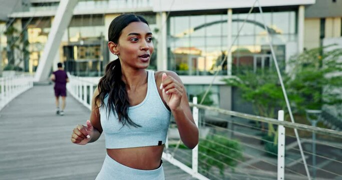High five, runner or woman in city for fitness training, exercise or cardio workout on outdoor bridge. Greeting, friends or happy Indian sports athlete with motivation for running on urban street