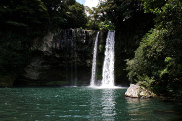 Fototapeta na wymiar Jeju Cheongiyeon Waterfalls