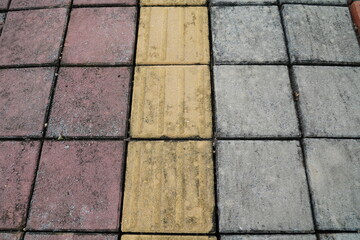 The walls of the house are made of cement.