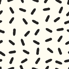Brush strokes vector seamless pattern in memphis style. Black dashes, lines, squiggles background. Simple hand drawn wallpaper print texture
