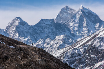 A trekker walking toward Everest base camp in Nepal