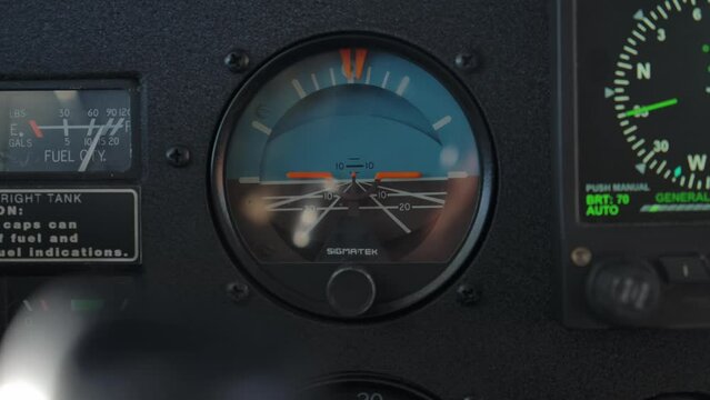 Standby Attitude Indicator on Flying Airplane Instrument Panel - CU