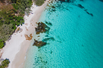 Koh Samet Island Thailand, aerial drone view from above at the Samed Island in Thailand with a turqouse colored ocean and a white tropical bay