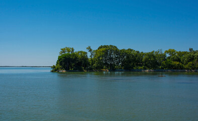 Fototapeta premium An island in the Grado section of the Marano and Grado Lagoon in Friuli-Venezia Giulia, north east Italy. August