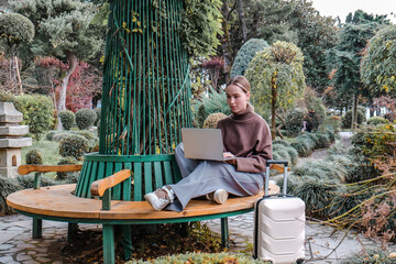 Business travel.Remote work. freelancer works remotely business travel.workation,remotely work,work life balance,digital nomad,workation,work travel,remot work.Travelling.Work from vacation remotely
