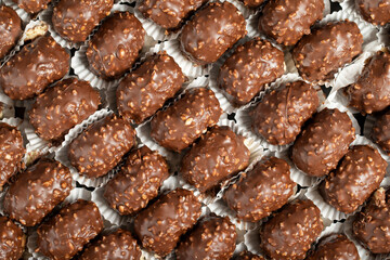 Hazelnut chocolate small cake. Chocolate and cream lançop cake. Top view