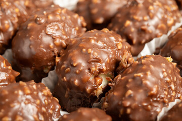 Hazelnut chocolate small cake. Chocolate and cream lançop cake. Close up