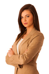 Portrait of young business woman in brown jacket isolated over white background - 692926324