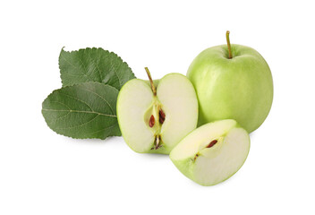 Whole, cut green apples and leaves isolated on white