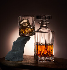 Glass and bottle of scotch