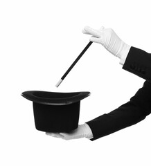 Magician showing magic trick with top hat on white background, closeup