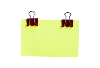 green sticky note with binder clip isolated on white background